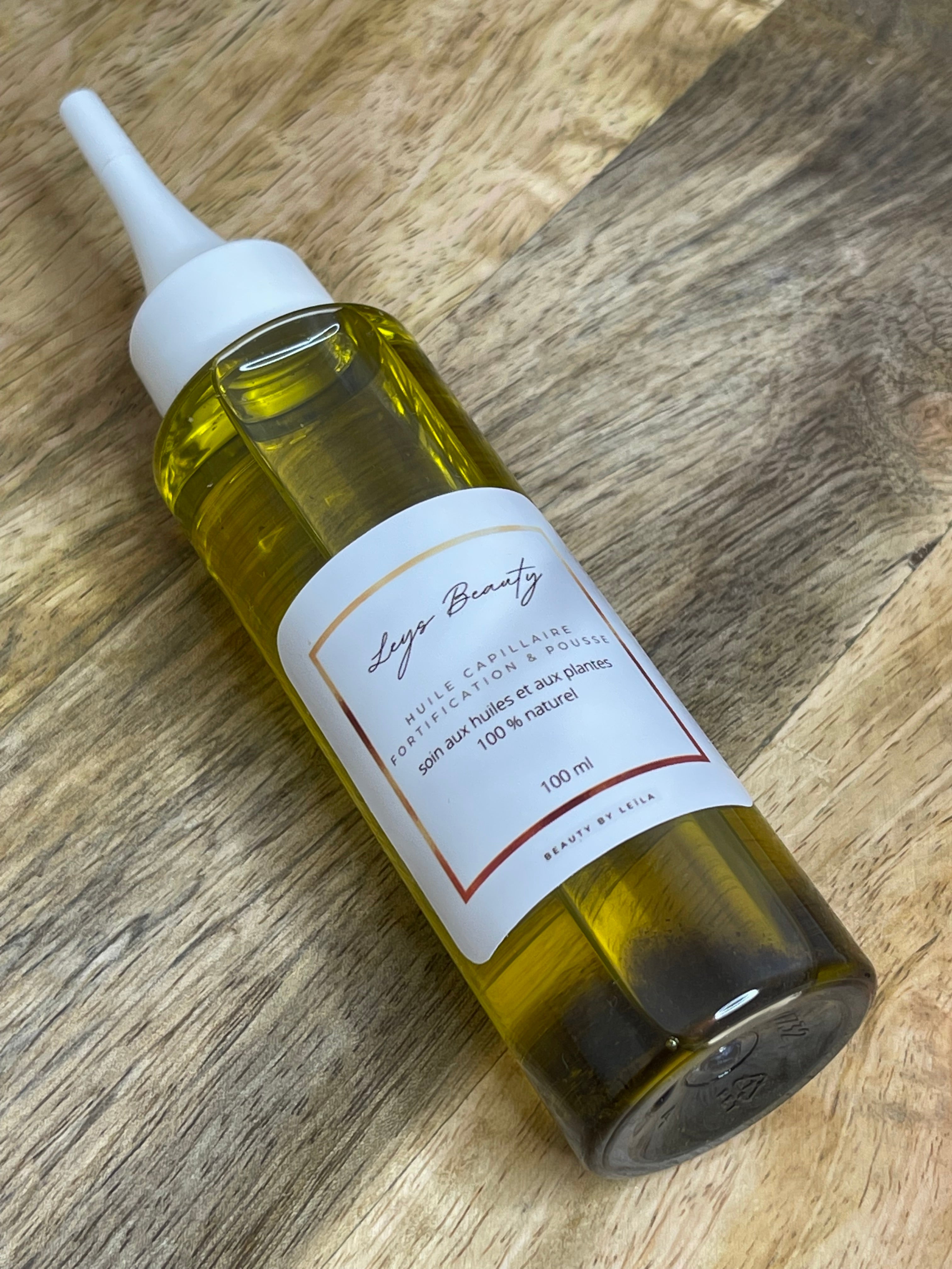 Huile pousse cheveux